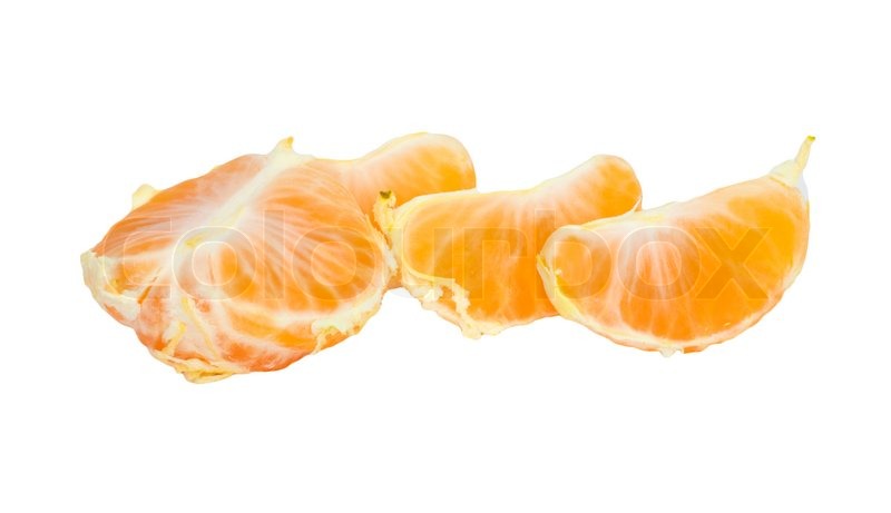 Slices of peeled orange on white ... | Stock Photo | Colourbox