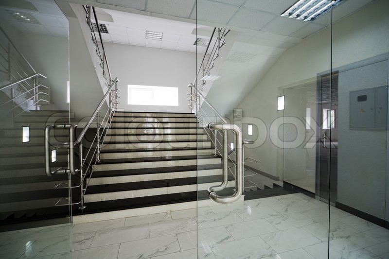 Glass Doors With A Kind On Marble Staircase Stock Photo Colourbox