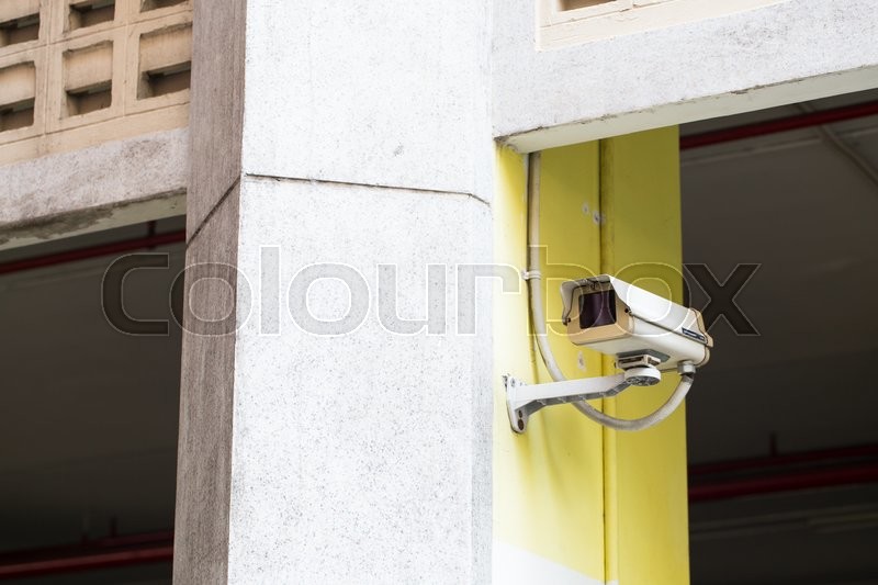 Cctv Camera Mounted On The Ceiling And Stock Image Colourbox