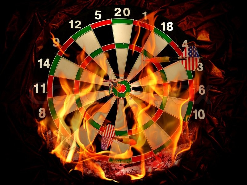 Dart with arrows in flame at crumpled | Stock image | Colourbox