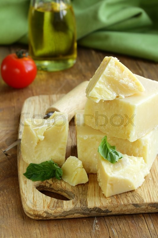 Hard natural parmesan cheese on a Stock image Colourbox