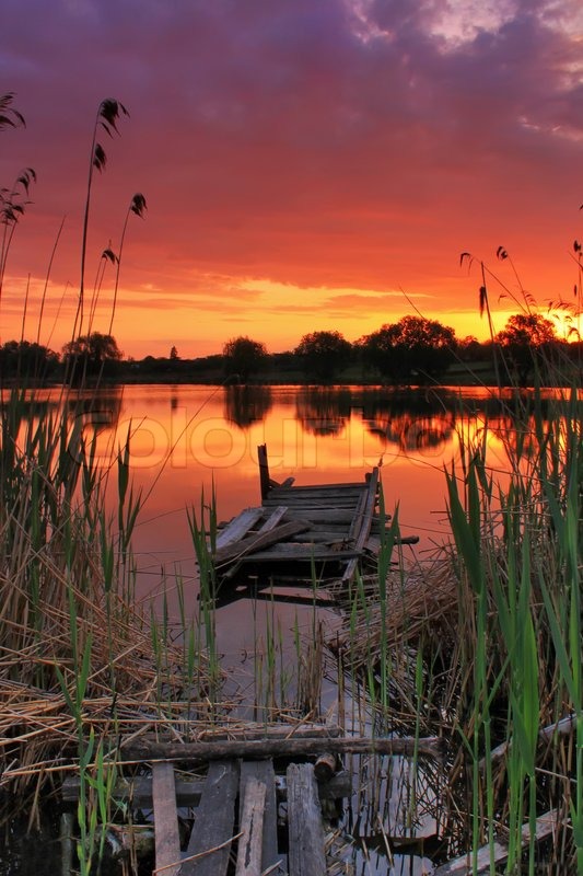 Old fishing bridge at sunset on the river  Stock Photo  Colourbox
