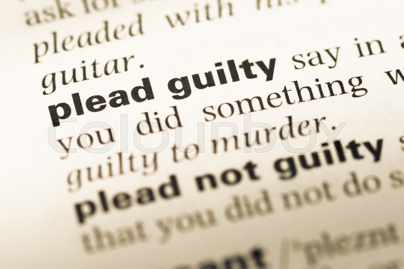 close up of old english dictionary page with word plead guilty another word for plead