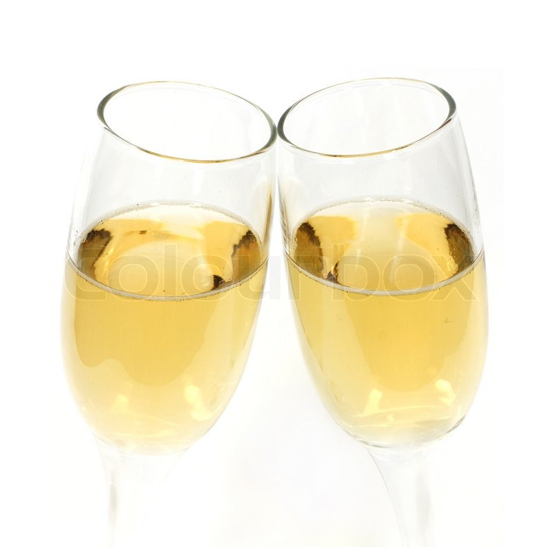 pair of champagne glasses making a toast stock photo colourbox