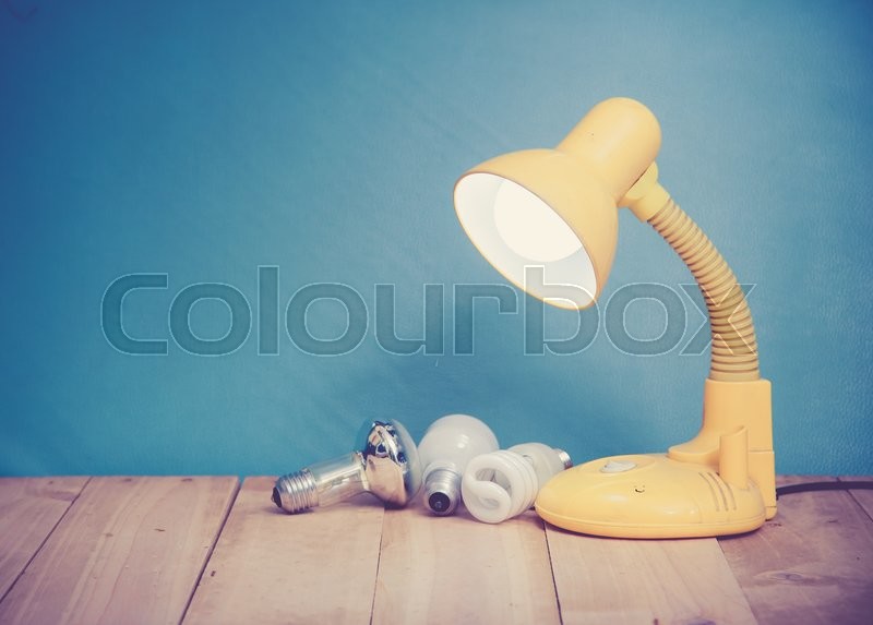Table lamp on wooden background,vintage | Stock image | Colourbox