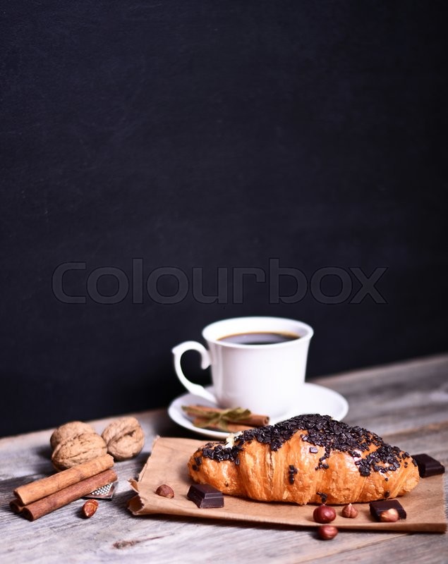 Chocolate Croissant With Coffee On Rustic Table Chocolate Croissant With Coffee On Rustic Table
