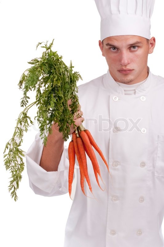 Der junge Küchenchef in Uniform und ... | Stock Bild | Colourbox