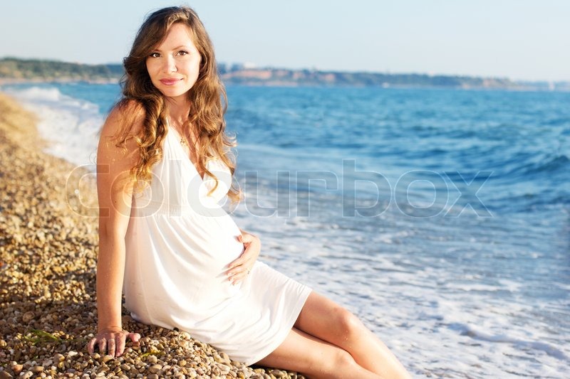 Frau am strand bilder