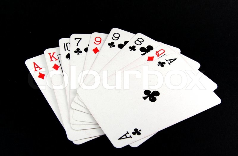 Playing cards on black background | Stock Photo | Colourbox