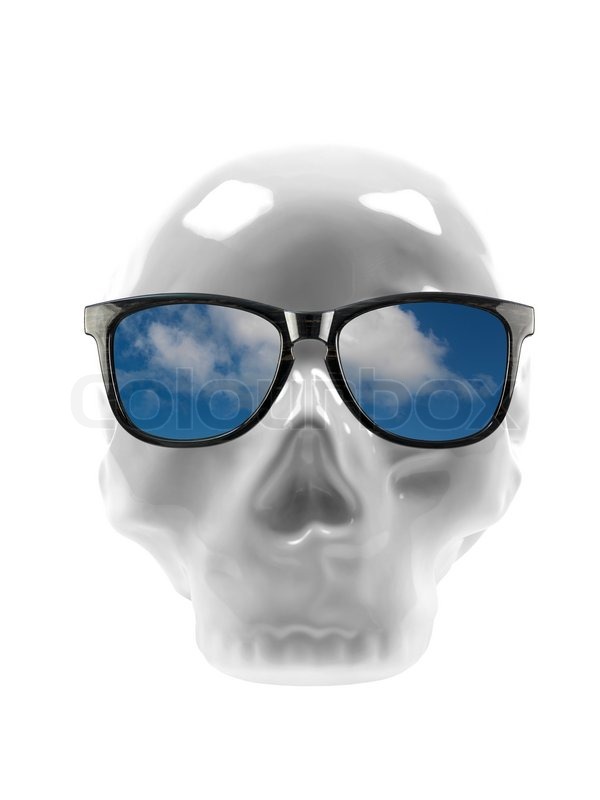 Sunglasses on a skull isolated against | Stock Photo | Colourbox