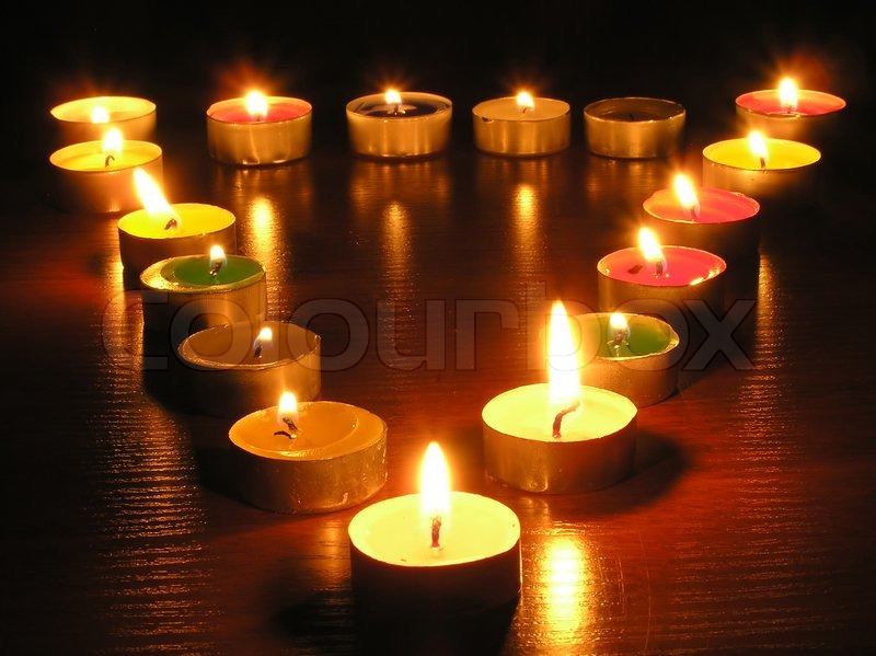 Candles at the form of a triangle Stock image Colourbox