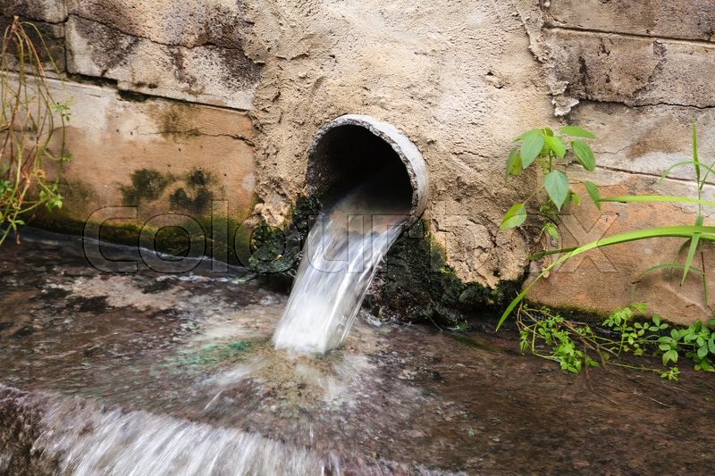 The waste water pipe from the village Stock image Colourbox