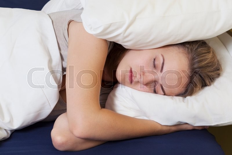 Young Woman With Her Head Under Her Stock Image Colourbox