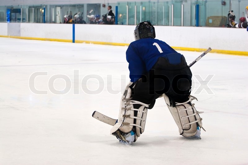 A hockey goalie awaiting the return of Stock Photo Colourbox