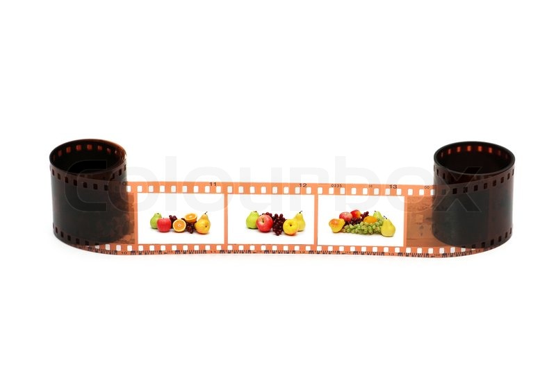 Rulle film med frugt billeder på hvid | Stock foto | Colourbox