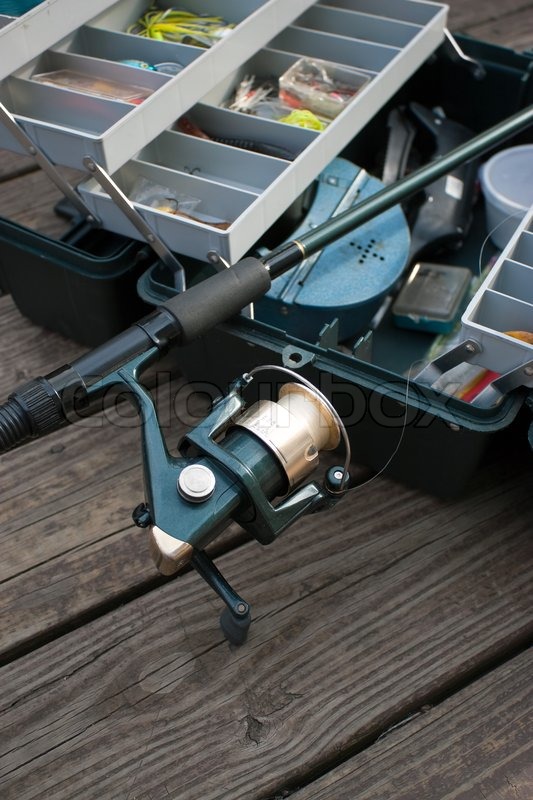 A fishermans rod reel and tackle box ... | Stock image | Colourbox
