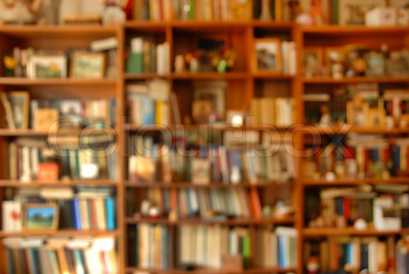 Blur wooden bookshelves with various colorful books background | Stock