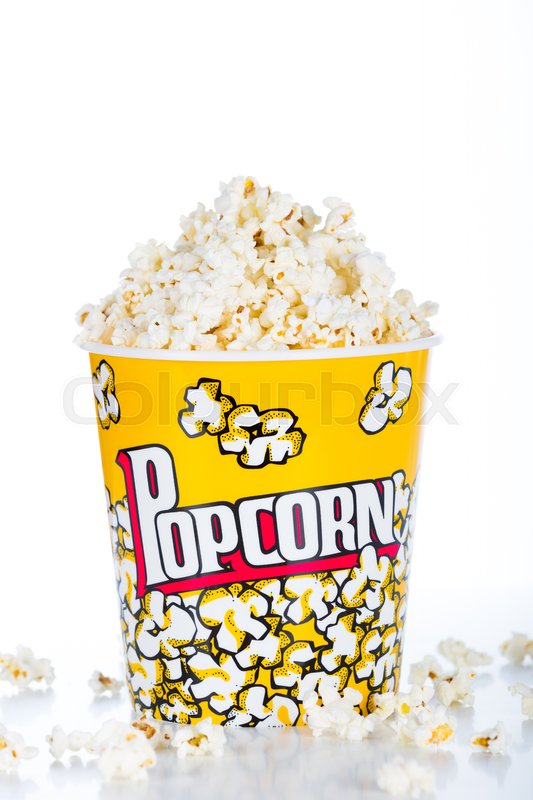 Large pot of popcorn on white Stock image Colourbox