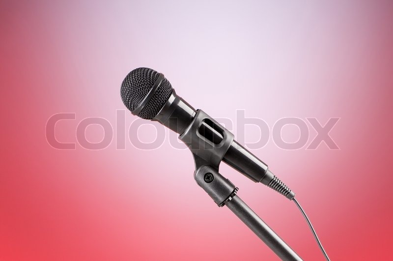 Black microphone against the colorful | Stock Photo | Colourbox