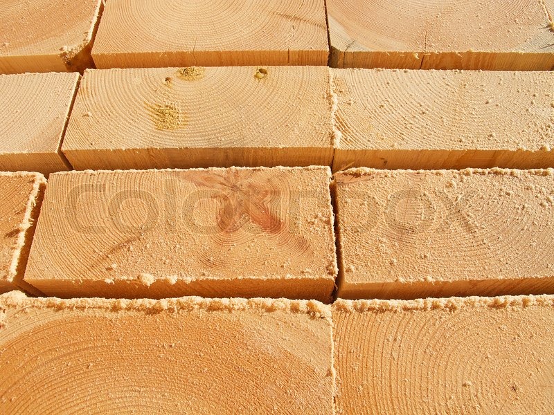 Stack of new wooden studs at the lumber ... | Stock image | Colourbox