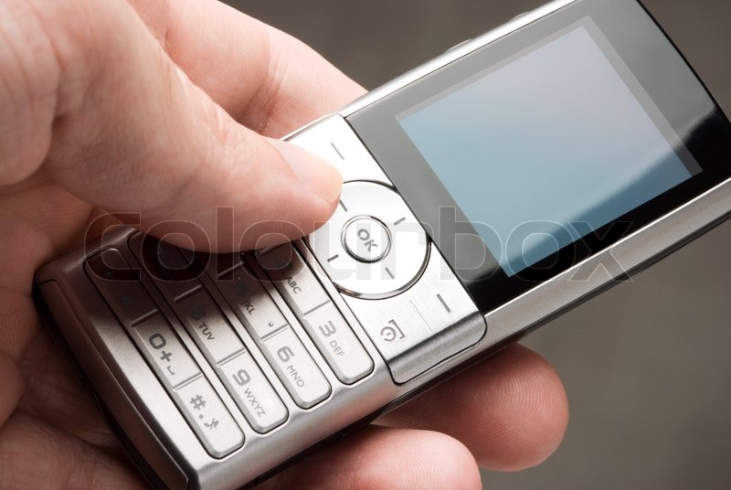 Moderne telefon med hænder , selektiv | Stock foto | Colourbox