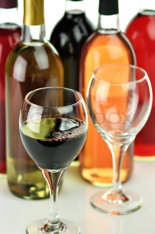 Assortment of wine bottles and glasses Stock image Colourbox