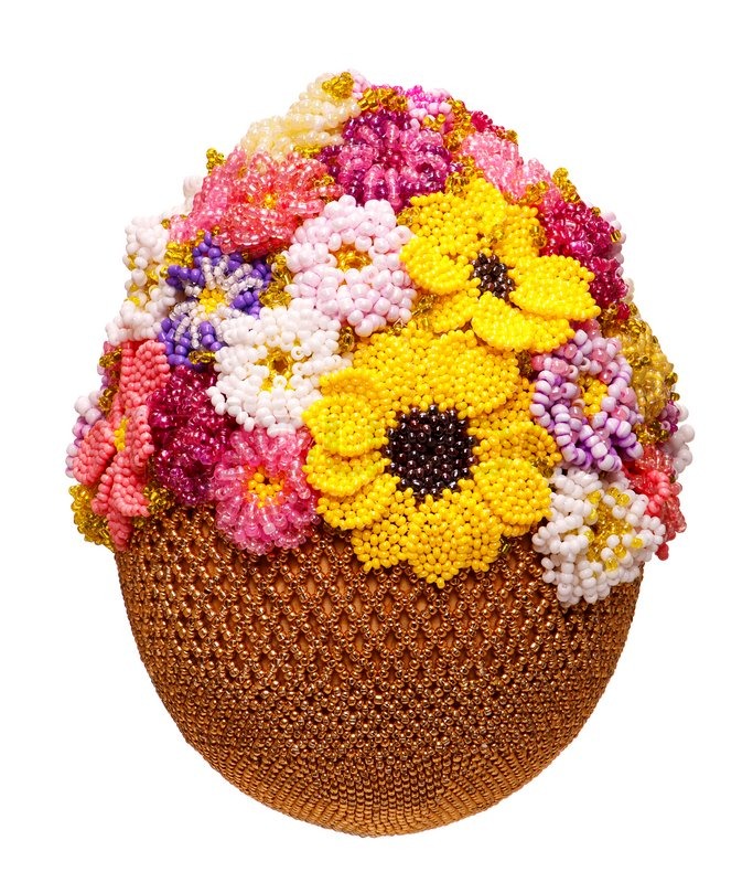 Egg decorated with beads isolated on Stock image Colourbox
