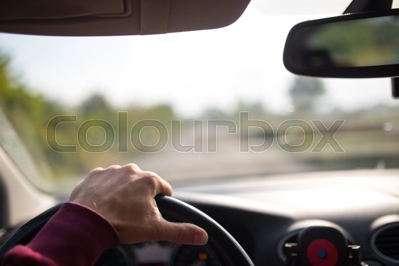 Hand Holding On Black Steering Wheel Stock Image Colourbox