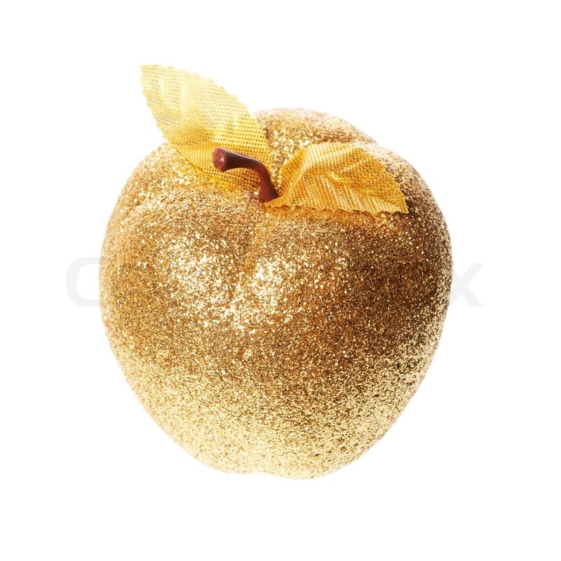 Goldener Apfel liegt auf einem weißen ... | Stock Bild | Colourbox
