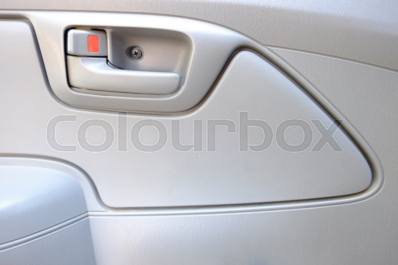 Inside car door lock beige color close up, background texture ... Inside car door lock beige color close up, background texture ...