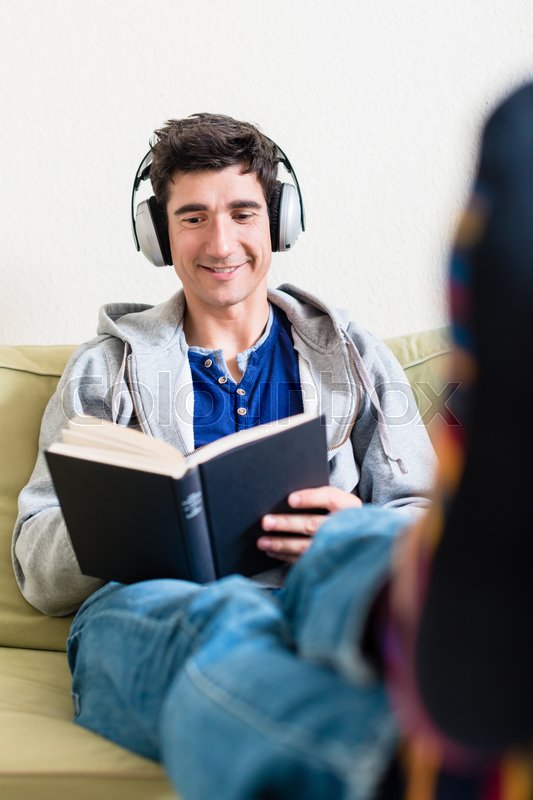 Relaxed Young Man Lying Down On The Stock Image Colourbox