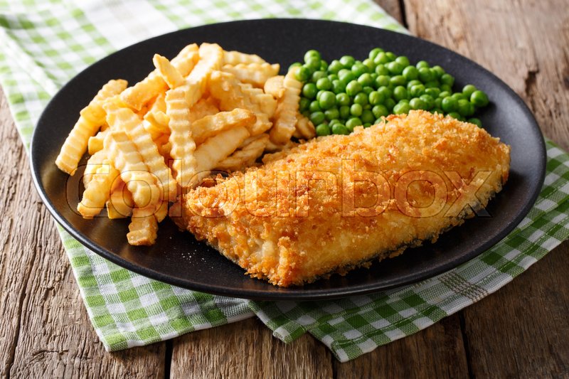 Delicious cod fish and chips with peas | Stock image | Colourbox