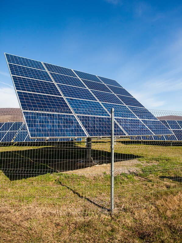 Solar panels against mountains Stock image Colourbox
