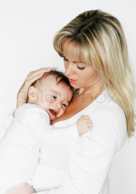 A Young Mother Comforting Her Child Stock Image Colourbox