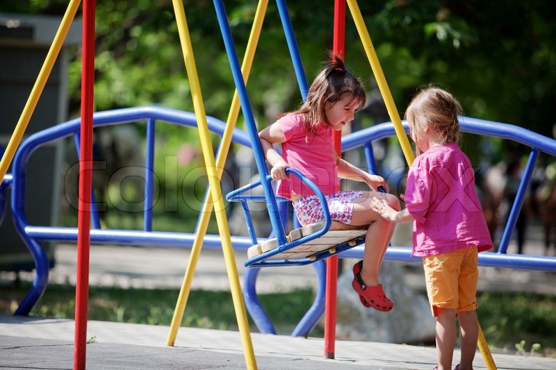 Children Playing On Playground In Park Stock Image Colourbox