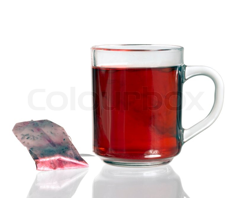 Glass teacup filled with tea and tea ... | Stock image | Colourbox