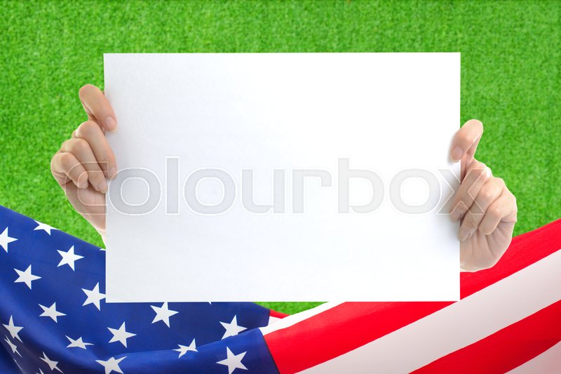 hand holding white blank paper sheet mockup with us flag border on
