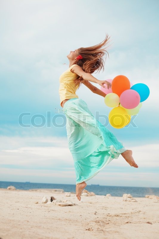 z flying press girl of air Happy balloons at the bunch holding colorful