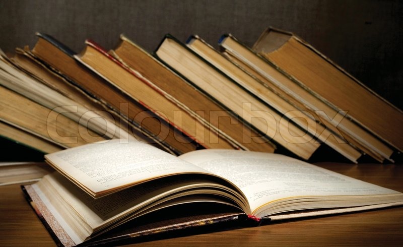 Stack Of Old Books Isolated On A White Background