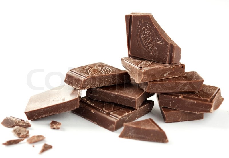 Broken chocolate bar on a white background | Stock Photo | Colourbox