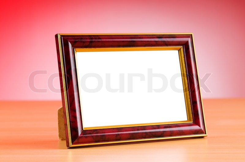 Photo frames on the table | Stock image | Colourbox