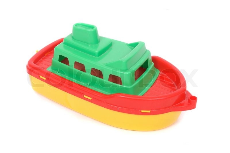 Plastic toy boat on the white background | Stock Photo ...