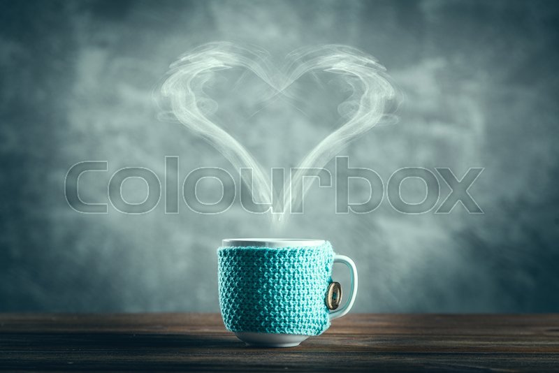 Cup of coffee with a heart shaped steam | Stock image | Colourbox