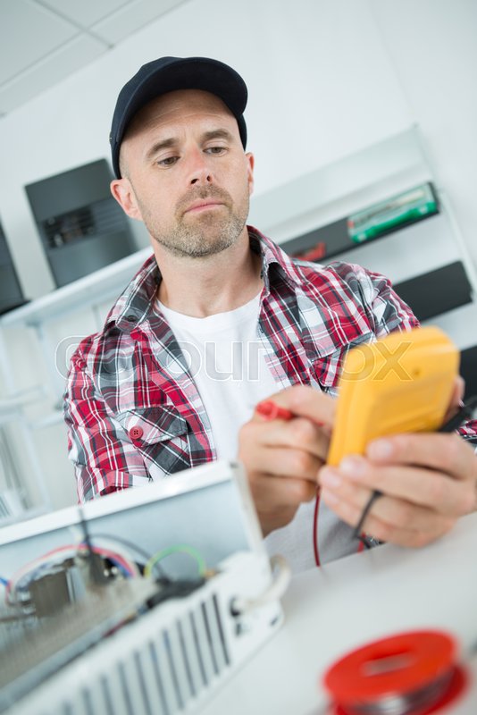 Electrician Using Multimeter Stock Image Colourbox