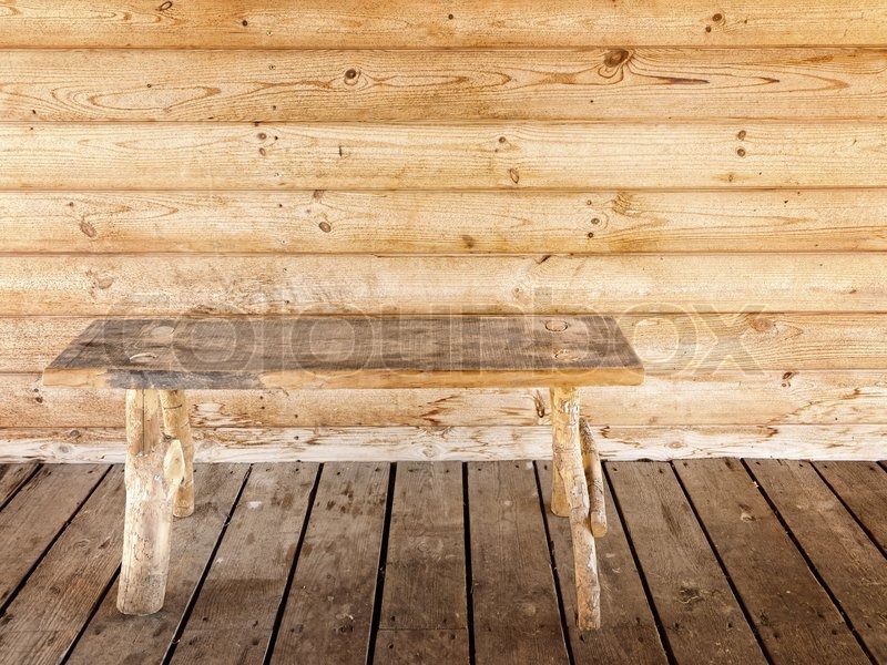 Alten Holzbank gegen Holzwand | Stock Bild | Colourbox