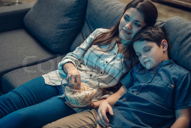 Little Boy Falling Asleep On His Mother Stock Image Colourbox