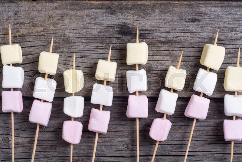 Colorful Marshmallow Skewers On Wooden Background Stock Photo, Picture