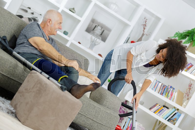Senior Man Walking Using Crutches On Stock Image Colourbox
