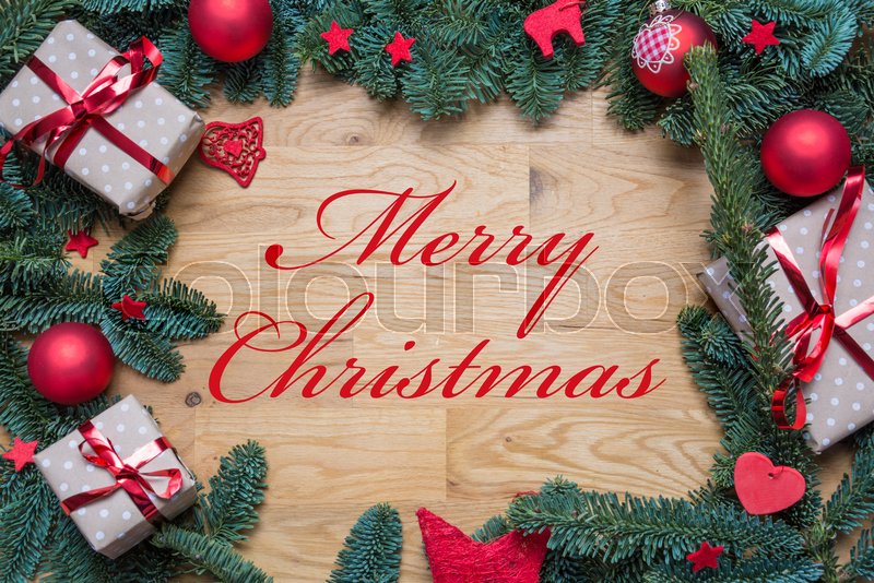 Merry Christmas in red on a Christmas | Stock Photo | Colourbox