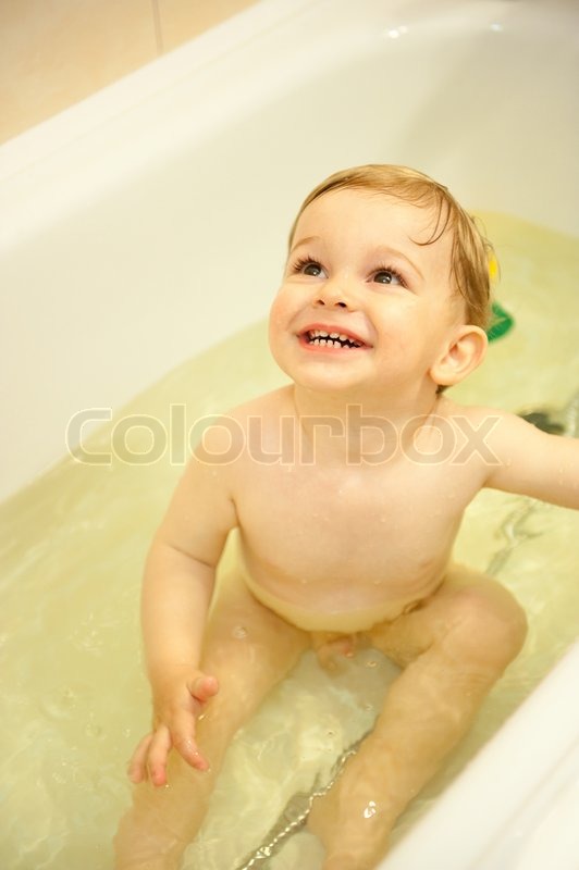 baby boy taking a bath